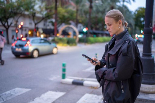 Mobile phone use and impatience: key risk factors for pedestrian safety in urban crossings
